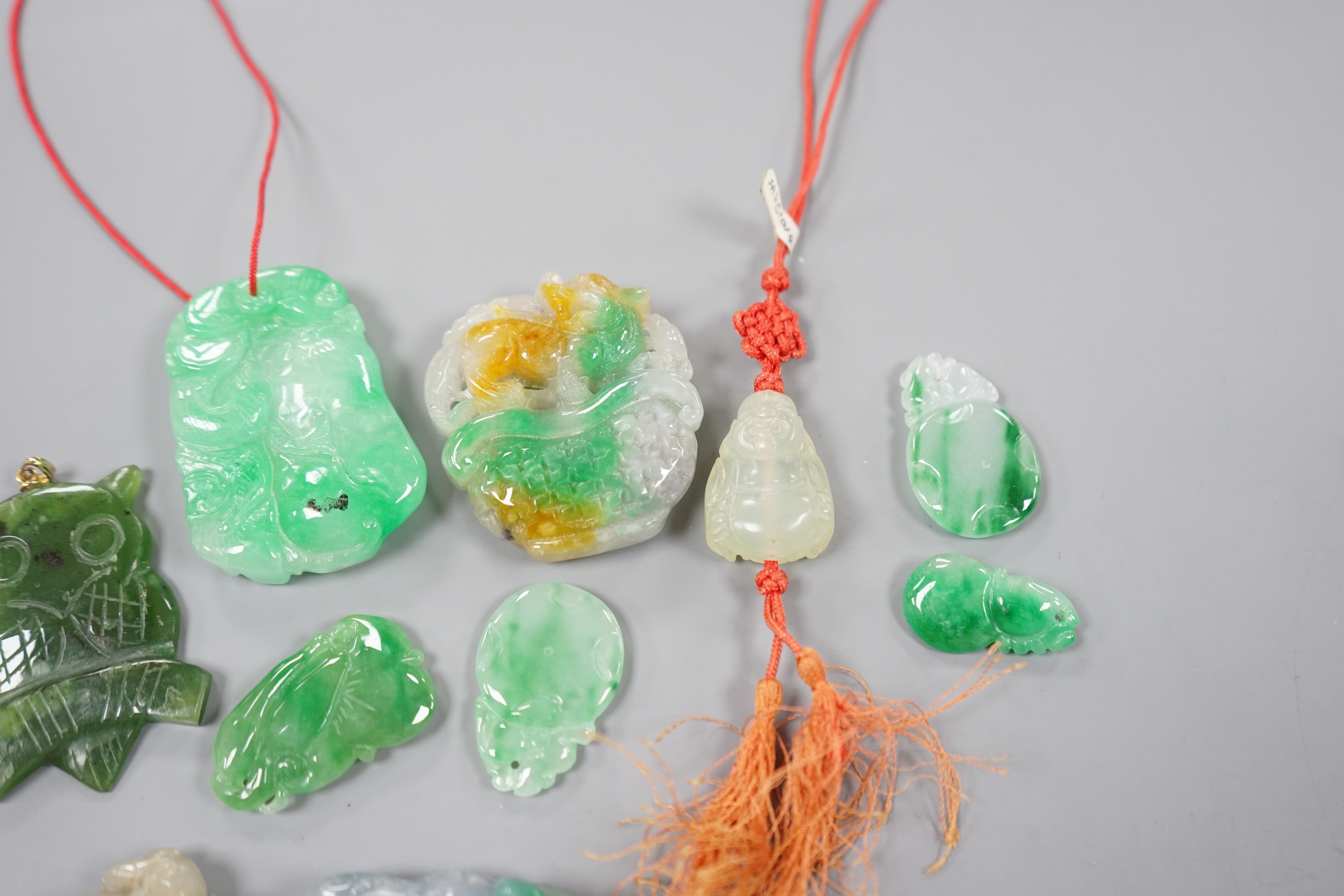 A group of ten jadeite and hardstone carvings and pendants